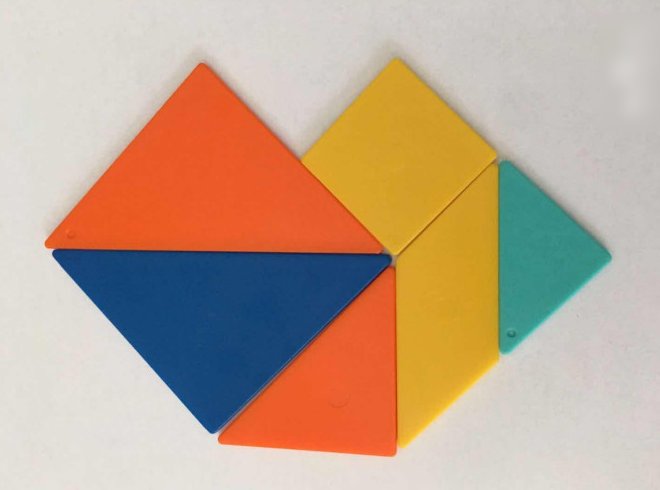 七巧板七块都用上能拼出六边形吗？如果能请说明怎么拼成