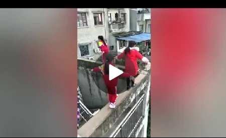 网曝多名学生20米高墙走钢丝无任何防护是真的吗？