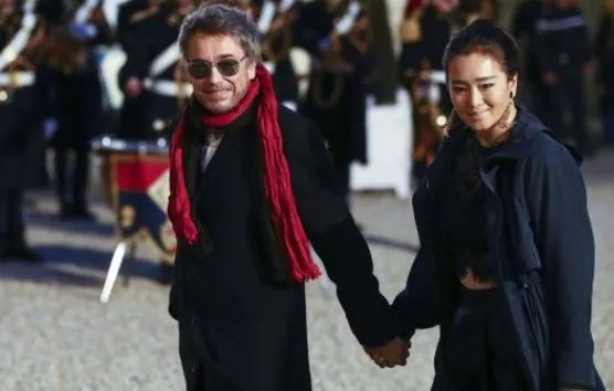 巩俐经历了8年张艺谋、富商黄和祥，是如何与大她18岁的米歇尔结婚的？